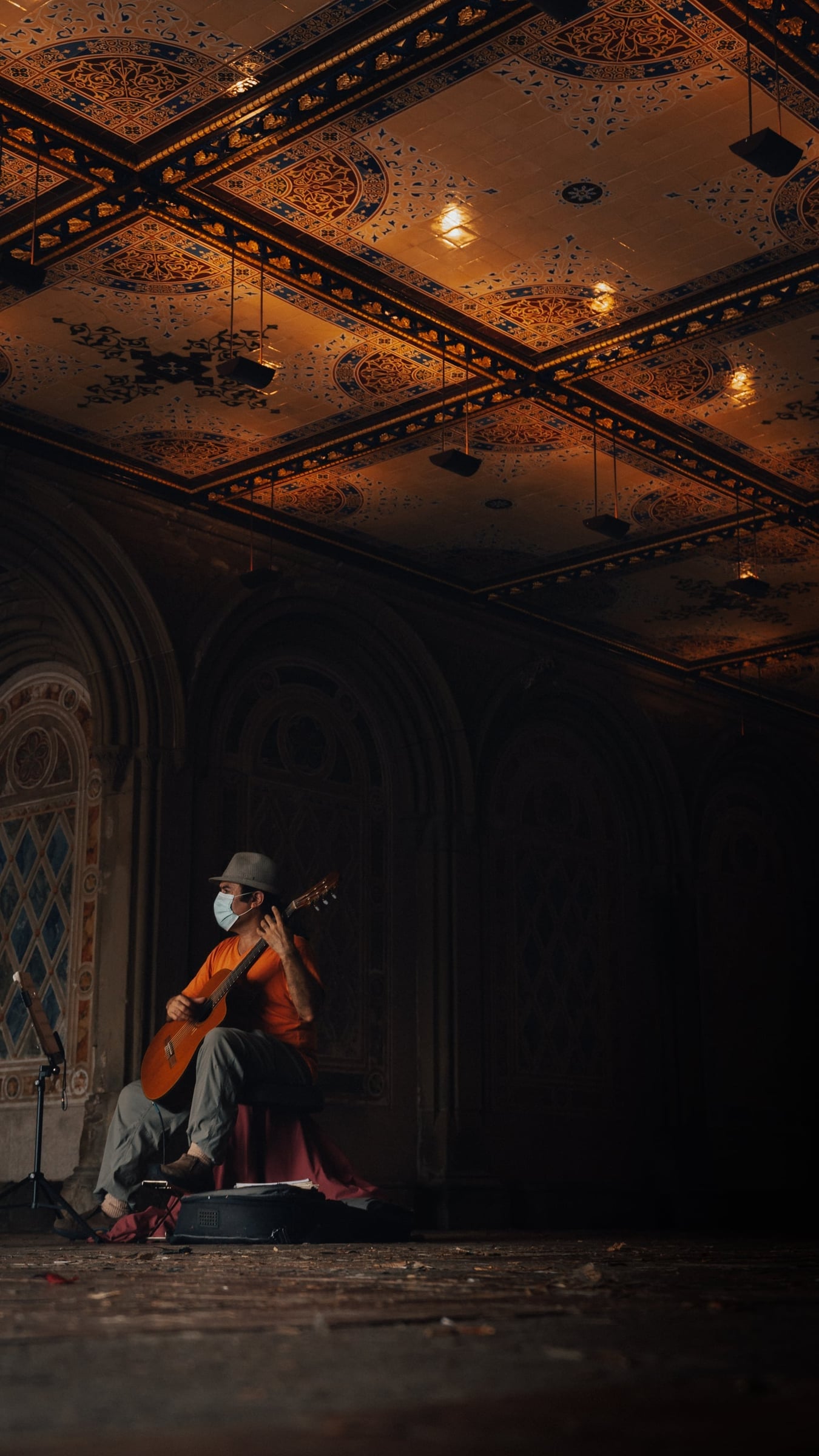 Guitarist performing in Bethesda Terrace arcade, Central Park, New York City — editorial documentary photography by Chauncey Scott, commercial photographer